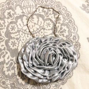 Silver rose beaded clutch